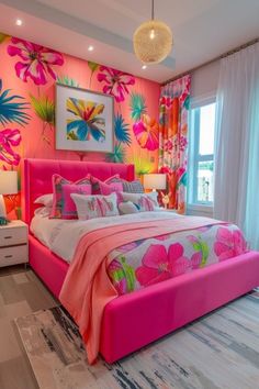 a bedroom decorated in bright colors with pink and green accents on the walls, along with a large bed