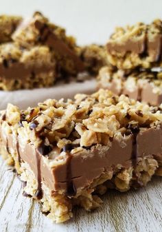 chocolate and oatmeal bars are stacked on top of each other, ready to be eaten