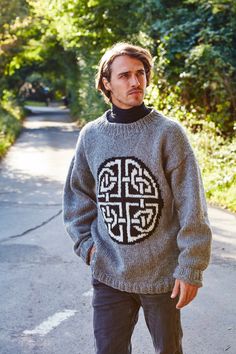 "Women's & Men's Celtic Unlined Sweater - Hand knitted wool oversized jumper. Chunky knit sloppy joe pullover. Celtic knot pattern. Fair Trade & Handmade in Nepal Inspired by Insular art, the Celtic Knot is said to represent eternity in loyalty, faith, friendship or love. A retro classic. 100% Wool Unlined Hand knitted Relaxed fit Fair Trade and Handmade in Nepal 100% Wool Dry clean - delicate S to fit UK Women's size 8-10. US Size 4-6 M to fit UK Women's size 12-14. US Size 8-10 M/L to fit chest 38-42\" (97-107cms) L/XL to fit chest 42-46\" (107-117cms) As our garments are handmade we do experience variation in sizing, so to ensure the best fit any information you can give us about the size of the person who the garment is for will be used by us to select the best individual fit we can. Knot Pattern, Knitting Group, Hand Knit Sweater, Oversize Pullover, Handmade Knitwear, Pull Oversize, Sloppy Joe, Knit Outerwear, Oversized Jumper