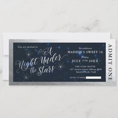 a blue and silver ticket for a new year's eve party with stars on it