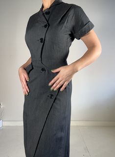 This dress is classic, and it has a beautiful fit. I sourced this is San Francisco. It's in perfect condition, not a button out of place. I believe the dress is 100% cotton. Please reach out with any questions.  Measurements Shoulder: 14 inches Sleeve length: 7 inches  Waist: 13 inches Hip: 18.5 inches Length: 42 inches Bottom opening: 22 inches PLEASE READ MEASUREMENTS *All items are measured flat. Measurements are not doubled.* EXCHANGE/STORE CREDIT ONLY Please view return policy DISCLOSURE Some items have been professionally cleaned and altered. Photos and measurements reflect the current state of the item. All additional care is the responsibility of the buyer. Floral Vests, Out Of Place, Womens Vintage Dresses, Knitted Bags, Wool Sweaters, Grey Sweater, Vintage Floral, Return Policy, Vintage Ladies