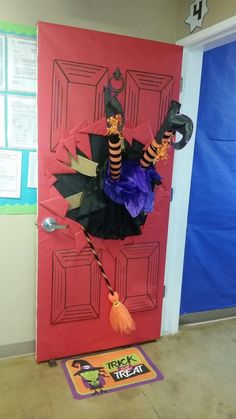 a door decorated to look like a witch