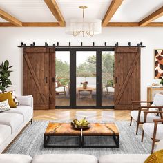 a living room with sliding glass doors and white couches