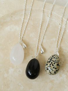 A super niche natural stone egg necklace! ~ Large three-dimensional egg-shaped white crystal spotted stone obsidian pendant With the classic 925 silver twist chain There is a cold niche design in the temperament. The pendant seems exaggerated. The upper body is invincible, fashionable and easy to match. Cheap Adjustable Large Pendant Jewelry, Egg Necklace Pendants, Black Onyx Crystal Necklace, Onyx Crystal Necklace, Egg Necklace, Obsidian Stone, Stone Pendant Necklace, Niche Design, Unique Gemstones