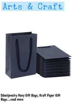 black paper bags are stacked on top of each other with the words arts & craft above them