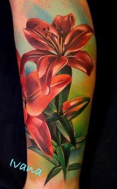 a tattoo with flowers painted on it