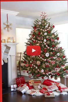 a decorated christmas tree with presents under it