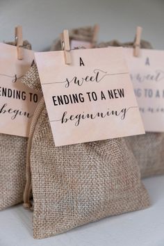 three burlap bags with tags on them that say, sending to a new beginning beginner