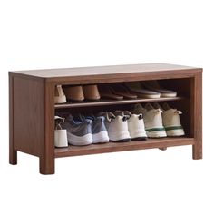 a wooden shoe rack with several pairs of shoes on it's sides and bottom shelf