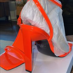 These Are A Very Fun Gorgeous Pair Of Neon Orange Nine West Heels. Never Worn I Typically Wear A Size 5 1/2 And Was Sent The Wrong Size. Now I’m Stuck With Two Pair Of The Same Shoes. Nothings Wrong With Them. Still In The Box. They Are Very Comfortable And True To Size. Details: Heel Height: 4.13" Toe Type: Open Toe Upper Material: Synthetic Outsole Material: Manmade Lining Material: Synthetic Product Collection: Heel Trendy Orange Sandals With Wrapped Heel, Orange Pointed Toe Sandals For Summer, Summer Orange Pointed Toe Sandals, Bold Heels For Night Out In Summer, Bold Ankle Strap Heels In Synthetic, Bold High Heel Synthetic Sandals, Bold Synthetic Ankle Strap Heels, Orange Beach Heels With Heel Strap, Trendy Orange Pointed Toe Sandals