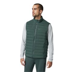 The best-selling Steadfast is back in a new, versatile vest form. This iteration keeps the same Responsibly Sourced Down-filled channels and durable water-repellent finish that makes the Steadfast a cold-weather classic. The sleeveless shape adds even more wearability—layer it over tees and sweaters or under your winter shell for extra warmth. DETAILS Lightweight Classic Fit Model is 6'2" / Size M Chest Pocket Internal Zip Pocket Vision Zippers Zip Hand Pockets FABRIC & CARE 84% Polyamide, 16% E Athleisure Sleeveless Outdoor Outerwear, Sleeveless Athleisure Outdoor Outerwear, Sporty Outdoor Vest Outerwear, Functional Vest For Outdoor Activities In Fall, Fitted Nylon Outdoor Vest, Sporty Vest For Outdoor Activities, Fitted Vest Outerwear For Functional Style, Fitted Sleeveless Functional Outerwear, Functional Sports Vest Outerwear