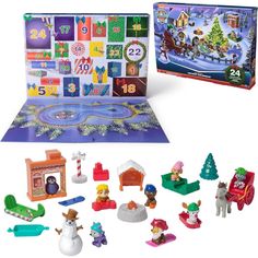 the christmas calendar is open and ready to be played by children with toys around it