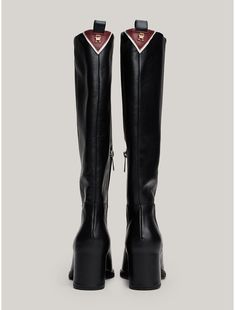 Tommy Hilfiger women's boot. These stylish knee-high boots are crafted from smooth leather that wraps around the block heel to create a seamless polished design.  Material: 100% Leather (fwa). Knee-high Leather Platform Moto Boots, Knee-high Leather Moto Boots With Reinforced Heel, Fitted Leather Knee-high Boots With Zipper Closure, Monogram Boots, Wide Calf Knee-high Moto Boots With Zipper Closure, Black Knee-high Moto Boots With Zipper Closure, Knee High Leather Boots, Tommy Hilfiger Women, Monogrammed Leather