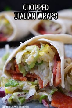 a close up of food on a plate with the words chopped italian wraps above it