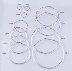 925 Sterling Silver Classic High Polish Hoop Earrings / 14K Gold Plated Sterling Silver Plain Shiny Hoop Earrings Measurements/Sizes Available 2mm Width Diameter Available 20,25,30,35,40,45,50,55,60mm Hypoallergenic Anti Tarnish Lead and Nickel Free Gift Box Included Classic Earrings, Custom Earrings, Sterling Silver Hoop Earrings, Sterling Silver Hoops, Earring Findings, Jewelry Earrings Hoops, Silver Hoops, Silver Hoop Earrings, Gold Plated Sterling Silver