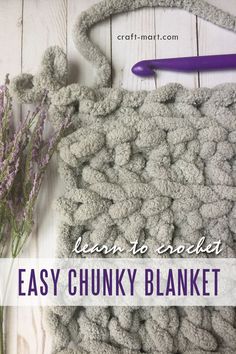 a crochet bag with the words easy chunky blanket next to it and lavender flowers