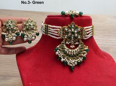 *Light Weight kundan choker necklace set. *Beautiful & Light in weight. *Pendent length- 3.5 inches( included pearl drops) *Pendent width- 1.9 inches *Earrings length: 2 inches (with drops) *Earrings diameter: 1.1 inches Green Meenakari Choker For Festivals, Bohemian Green Kundan Necklace For Diwali, Green Kundan Choker Necklace For Diwali, Green Chandbali Choker For Diwali, Diwali Green Chandbali Choker, Green Kundan Choker Necklace For Gifting, Green Kundan Choker Necklace Bollywood Style, Green Chandbali Choker For Festive Occasions, Green Heavy Chandbali Choker