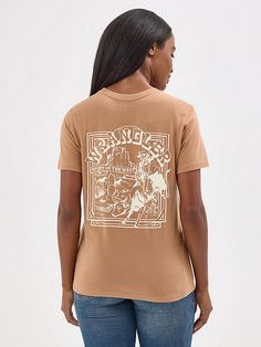 Channel the spirit of the West with a little help from our Women’s Wrangler Retro® Western Back Graphic Tee. This classic crewneck tee features a regular fit that’s not too loose or tight, just perfect. It’s crafted from cotton for an airy feel. Plus, the Wrangler® rope logo at the chest and a retro-inspired print of a bull rider across the back will add some authenticity to any outfit. Wrangler Women, Bull Rider, Bull Riders, Retro Western, A Bull, Women's Tops, Workout Tee, Retro Inspired, Womens Tees