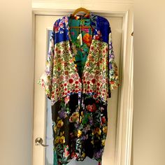 Nwt/Stunning,Boho Chic, Johnny Was 100% Silk Flower Panya Reversible Shawl Collar Kimono. Concealed Front Closure On Both Sides/Side Slits At The Bottom. One Side Features A Floral Print Colorblocked Print Of Various Flowers, The Reverse Side Butterflies,Hibiscus,Lilies, Leaves & Other Flowers. A Gorgeous Piece Of Art! Xl Floral Print Relaxed Fit Summer Outerwear, Summer Floral Print Relaxed Fit Outerwear, Spring Outerwear With Patchwork And Kimono Sleeves, Blue Floral Print Outerwear For Vacation, Bohemian Multicolor Outerwear For Daywear, Spring Floral Print Outerwear With Kimono Sleeves, Multicolor Floral Print Outerwear For Spring, Multicolor Outerwear With Floral Print And Kimono Sleeves, Multicolor Bohemian Outerwear