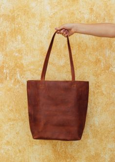 Tote-ally in love with our Classic Leather Tote 😍 Practical and in-style. Designed with a variety of convenient compartments to hold all your belongings securely. Large Handmade Shoulder Bag For Everyday, Everyday Leather Bag With Flat Pocket, Brown Bag For Everyday Use, Brown Tote Bag With Flat Pocket, Artisan Brown Everyday Bag, Artisan Brown Bag For Everyday, Brown Bag With Flat Pocket For Everyday Use, Brown Bags With Flat Pocket For Everyday Use, Artisan Everyday Tote Shoulder Bag