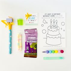 the contents of a birthday party including candy, toothbrush and coloring book