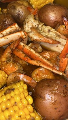 crab boil with corn and potatoes in a pot