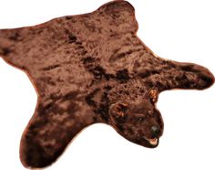 a brown bear rug is shown on a white background with the image of an animal's head