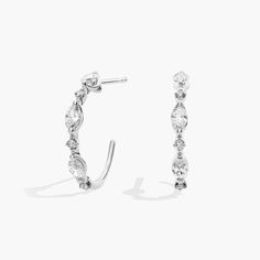 Show off your style with these unique J-shaped diamond hoop earrings. Featuring both round and marquise diamonds set in 14k gold, these hoops are crafted to last. Diamond Hoop Earrings, Marquise Diamond, Blue Nile, Diamond Fashion, Show Off, Fashion Earrings, Your Style, Jewelry Earrings, Hoop Earrings