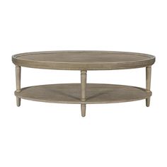 an oval coffee table with two shelves on each side