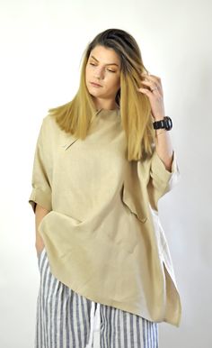 "Linen Shirt, Women Shirt, Beige Shirt Linen Top. Woman exstravgant loose shirt. Handmade linen shirt. Beautiful and comfortable. Linen Summer Blouse. Comfortable top. Asymmetric Loose shirt. Excellent style for a spring and summer seasons. ◾Quality NATURAL linen fabric. Color :Beige Model wearring size S. Fabric: 100% Linen ◾ The style was originally designed and professionally constructed by me. Each item of my shop is specially packaged with a lot of concern! Handmade in a pet-free and smoke- Relaxed Fit Tunic Top In Lagenlook Style, Oversized Spring Tunic Tops, Relaxed Fit Lagenlook Tunic Top, Oversized Tunic Tops For Spring, Oversized Long Sleeve Beige Blouse, Casual Oversized Tunic Top, Casual Shirt With Asymmetrical Hem And Relaxed Fit, Casual Shirt With Relaxed Fit And Asymmetrical Hem, Oversized Beige Summer Shirt