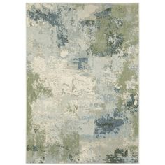 an abstract rug with blue and green colors