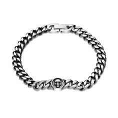 Capture his mysterious and dark side with this bold skull curb chain bracelet in sterling silver and black ion plate. Crafted in stainless steel This 10.0mm-wide design features solid curb links with cool white centres and black ion-plated edges. Polished and satin-finished details lend further contrast to the look. A sculpted skull atop the round center station completes this edgy style. The 8.5-inch bracelet secures with a fold-over clasp. Presents For Your Boyfriend, Man Crafts, Curb Chain Bracelet, Mens Bracelet Silver, Skull Bracelet, Edgy Style, Minimalist Bracelet, Bracelet For Men, The 8