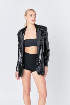 This Sequin Oversized Jacket is a chic addition to your wardrobe. Featuring a taffeta peaked lapel and V neckline this jacket is sparkly and eye-catching with its sequin embellishments. The long sleeves make it a perfect option for a night out or special occasion. This statement piece is sure to make you stand out. Enhance your style and make a statement with this Sequin Oversized Jacket! Sequins Taffeta peaked lapel V neckline Long sleeves Shoulder pads Contrast fake flap pocket Front button cl Chic Embellished Outerwear For Party Season, Chic Sequined Evening Outerwear, Chic Sequined Outerwear For Evening, Glamorous Sequin Outerwear For Evening, Glamorous Sequined Evening Outerwear, Black Sequined Outerwear For Party Season, Glamorous Embellished Outerwear For Party, Glamorous Embellished Party Outerwear, Black Sequined Blazer For Night Out