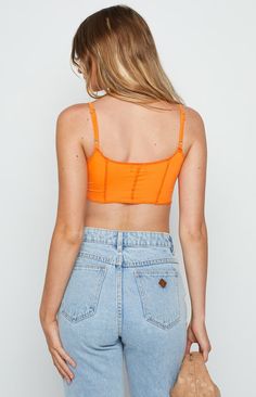 Orange Crop Top

Our best selling crop now comes in a bold 'n bright orange - simply perfect for those summer days! Style with jeans and sandals for a fun and colourful summer style!
Cropped length
Slight scoop neckline
Adjustable spaghetti straps
Thin-soft material with stretch
Exposed seams
Unlined
V hem Orange Crop Top, Prom Midi Dress, Summer Playsuit, Exposed Seams, Sweater Crop, Beginning Boutique, Strapless Tops, Long Crop Top, Crop Top Sweater