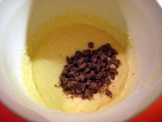 a bowl filled with batter and chocolate chips