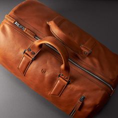 Substantial Leather Duffle Bag · Tan by Capra Leather Men's travel overnight bag design. product design made with full grain leather and linen interior. Unique color bag for men Duffle Bag Men, Leather Duffle Bag Men, Mens Duffle Bag, Leather Weekender Bag, Leather Duffel, No Thanks, Leather Backpacks, Backpack Pattern, Leather Rucksack