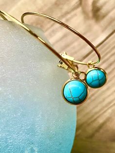 Excited to share this item from my #etsy shop: Turquoise gemstone Charm Hoop Earrings, Gold, dangling, charm, stone, Round, Hoops, Hoop Earrings, Gold #circle #latchback #earlobe #blue #southwestern #gold #turquoise #hoops #hoopearrings #handmade Gift Hoop Earrings With Natural Stones, Turquoise Dangle Hoop Earrings Nickel Free, Hoop Earrings With Natural Stones, Bohemian Hoop Earrings With Dangling Charms For Gift, Bohemian Hoop Earrings With Dangling Charms As Gift, Nickel-free Turquoise Dangle Hoop Earrings, Turquoise Dangle Hoop Earrings For Gift, Turquoise Hoop Earrings With Natural Stones, Blue Natural Stone Dangle Hoop Earrings