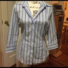 Nwot Express Size Medium Shirt , 3/4 Sleeves. Striped Shirt. 77% Cotton, 20% Nylon, 3% Spandex. Button Down Shirt. Blue Stretch Collared Blouse, Blue Half Sleeve Blouse With Buttons, Spring Office Shirt With Half Sleeves, Spring Office Half Sleeve Shirt, Half Sleeve Shirt For Office In Spring, Blue Fitted Half-sleeve Blouse, Fitted Half Sleeve Shirt With Button Closure, Spring Office Shirt With 3/4 Sleeves, Blue Half Sleeve Shirt For Workwear