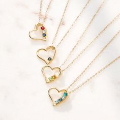 Accessorize with a little love. Three sweet birthstones are embedded in the side of this gold open heart pendant. Lovely necklace comes on a gold chain. Coordinates Jewelry, Family Tree Necklace, Monogram Jewelry, Valentines Day Gifts For Her, Cz Stud Earrings, Birthstone Pendant, Heart Shape Pendant, Gifts For Your Girlfriend, Lovely Necklace