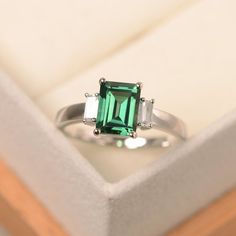 Silver Octagon Emerald Ring, Green Sapphire Ring With Prong Setting, Emerald Cut, Silver Emerald Cut Ring For May Birthstone, Green Emerald-cut Sapphire Wedding Ring, Green Emerald Cut Sapphire Ring With Prong Setting, Radiant Cut Emerald Ring In Sterling Silver For Wedding, Emerald Cut Green Sapphire Ring With Prong Setting, Emerald Cut Solitaire Sapphire Ring, Emerald Cut Green Sapphire Wedding Ring