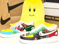 Nike Air Force Shoes with custom Super Mario Bros theme.  I can add different characters, scenes, etc. just reached out to me if interested. I use leather paint and sealant. Mario Air Force Ones, Super Mario Shoes, Nike Air Force Shoes, Super Mario Bros Theme, Mario Shoes, Nike Air Force 1 Custom Pokemon, Naruto Air Force 1, Nike Air Force 1 Custom One Piece, Air Force Shoes