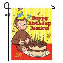 a happy birthday banner with a monkey holding a cake