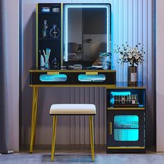 a desk with a mirror, stool and vase on it in front of a blue tint wall