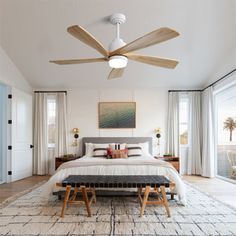 a bed room with a neatly made bed and a ceiling fan in the middle of it