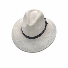 Shape: Panama Hat, Indiana StyleMaterial: Yute, Leather Size: Medium & LargeBrim: 3.25”Color: Off-WhiteDetail: Leather BandHat Care: Always handle your hat by the top. Do not place hat with brim on the surface, it will cause it to flatten the brim. Always Brim turned up.To dust off, use a soft brush.To remove stains, wipe with a cloth, then let it dry naturally with the brim turned up.Steam it to shape if necessary.Misshapen flat brim straw hats can be shaped carefully with a lukewarm - not White Fedora With Curved Brim, White Panama Hat With Curved Brim, Toquilla Straw Fedora With Curved Brim, Cream Brimmed Panama Hat For Travel, Short Brim Toquilla Straw Panama Hat, White Toquilla Straw Fedora With Short Brim, White Western Fedora Panama Hat, White Brimmed Fedora For Kentucky Derby, Cream Wide Brim Panama Hat For Travel