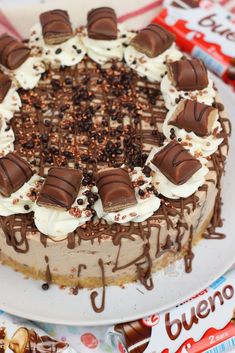 there is a cake with chocolate and cream toppings on it