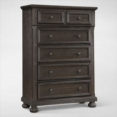 a dark brown dresser with four drawers