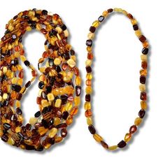 Baltic Amber Multicolored Square shaped beads Necklace Natural Baltic Multicolored Amber 23.5" in length, square shaped bead necklace/bead strand, wear or use in your designs! Beads are slightly graduated. You will receive one Necklace/Bead strand. Small plastic screw clasp included. Made in Lithuania. Arrives to your home with the "All About Amber" brochure which includes care instructions! Enjoy Shopping! Multicolor Beaded Rectangular Necklace, Adjustable Multicolor Rectangular Beaded Necklaces, Multicolor Square Beaded Jewelry, Multicolor Rectangular Beaded Necklaces, Large Rectangular Multicolor Beads, Rectangular Beads For Gifts, Multicolor Rectangular Gemstone Beads Jewelry, Necklace Bead, Beads Necklace