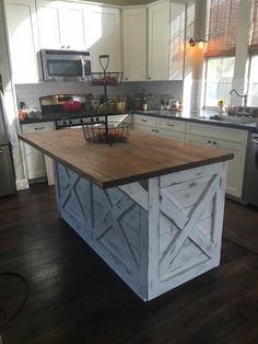 a kitchen island made out of barn doors