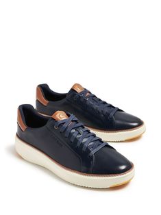 Find COLE HAAN Grandprø Topspin Sneakers on Editorialist. navy blue calf leather brushed finish front lace-up fastening logo patch at the tongue contrasting heel counter debossed logo to the side round toe flat rubber sole Classic Navy Sneakers With Contrast Sole, Navy Leather Lace-up Sneakers, Classic Blue Sneakers With Contrast Sole, Classic Navy Sneakers With Round Toe, Blue High-top Sneakers With Stitched Sole, Navy Sneakers With Contrast Sole And Round Toe, Classic Blue Sneakers With Perforated Toe Box, Navy Sneakers With Contrast Sole, Navy Lace-up Sneakers With Contrast Sole